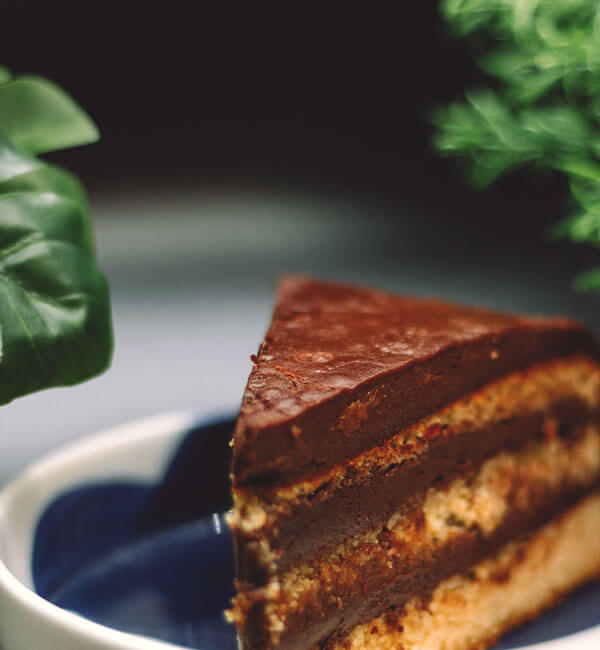 A slice of chocolate cake with berries